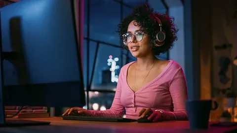 A team of gaming marketing creators analyzing live streaming metrics